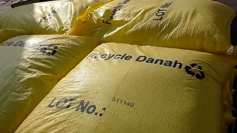 Yellow Recycle Danah 25 kg bags with lot numbers